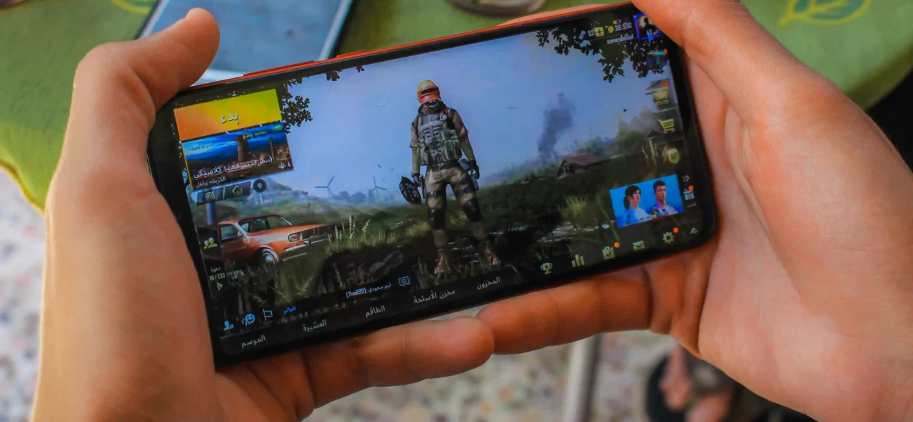 a user playing games on mobile